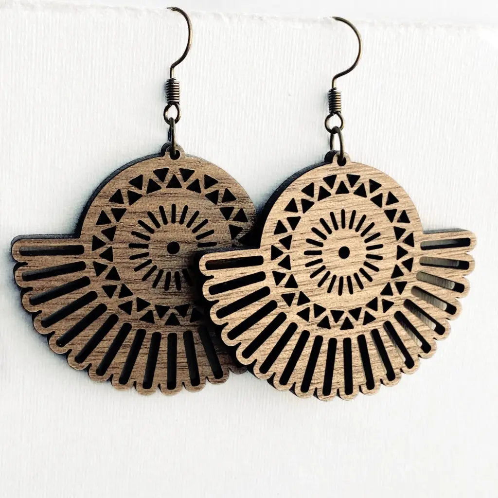Add Wood Drop Earrings Boho wooden earrings with intricate sunburst and tribal patterns. Lightweight statement accessories perfect for earthy, artistic, and free-spirited styles.