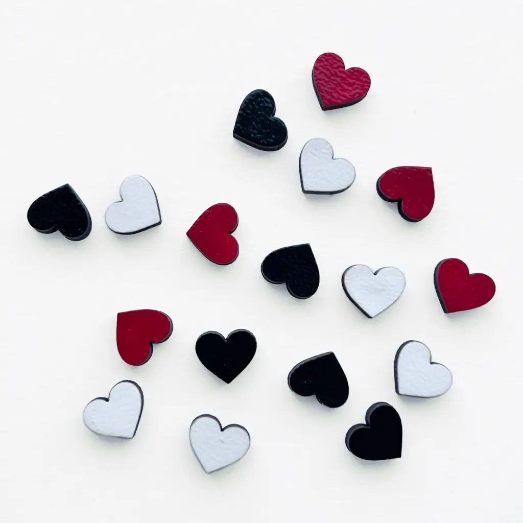 Heart wood stud earrings, hand-painted with a titanium post. Lightweight, hypoallergenic, and available in multiple color options. Perfect for any occasion