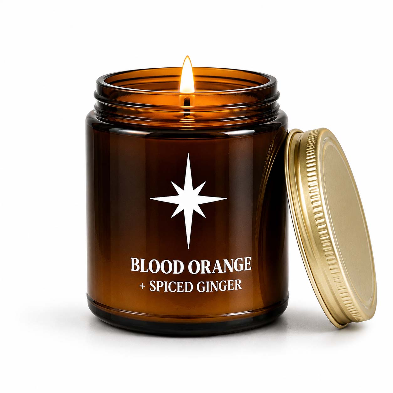 Blood Orange and Spiced Ginger Scented Candle with flame