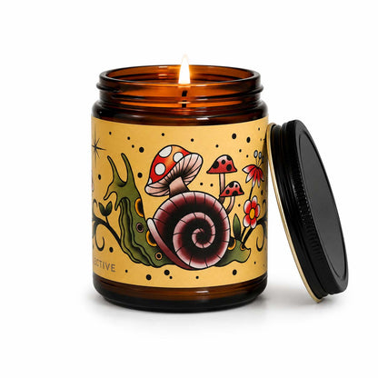 Moss and Meadow Scented Candle Burrow and Bloom with flame