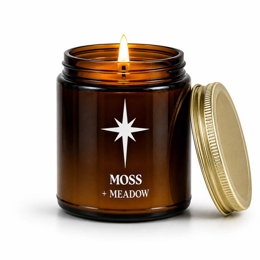 Moss and Meadow Scented Candle with flame