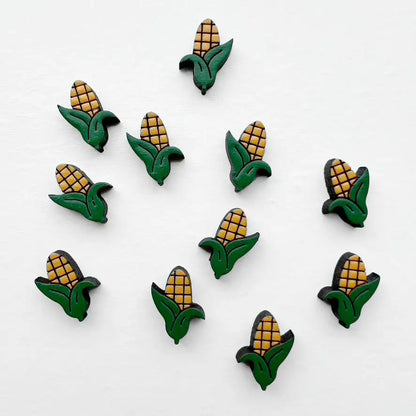 Corn Wood Stud Earrings - Painted Wood Stud Earrings Fun corn-shaped wood stud earrings with hand-painted details and titanium posts. Lightweight, hypoallergenic, and perfect for Midwest pride or Nebraska lovers.