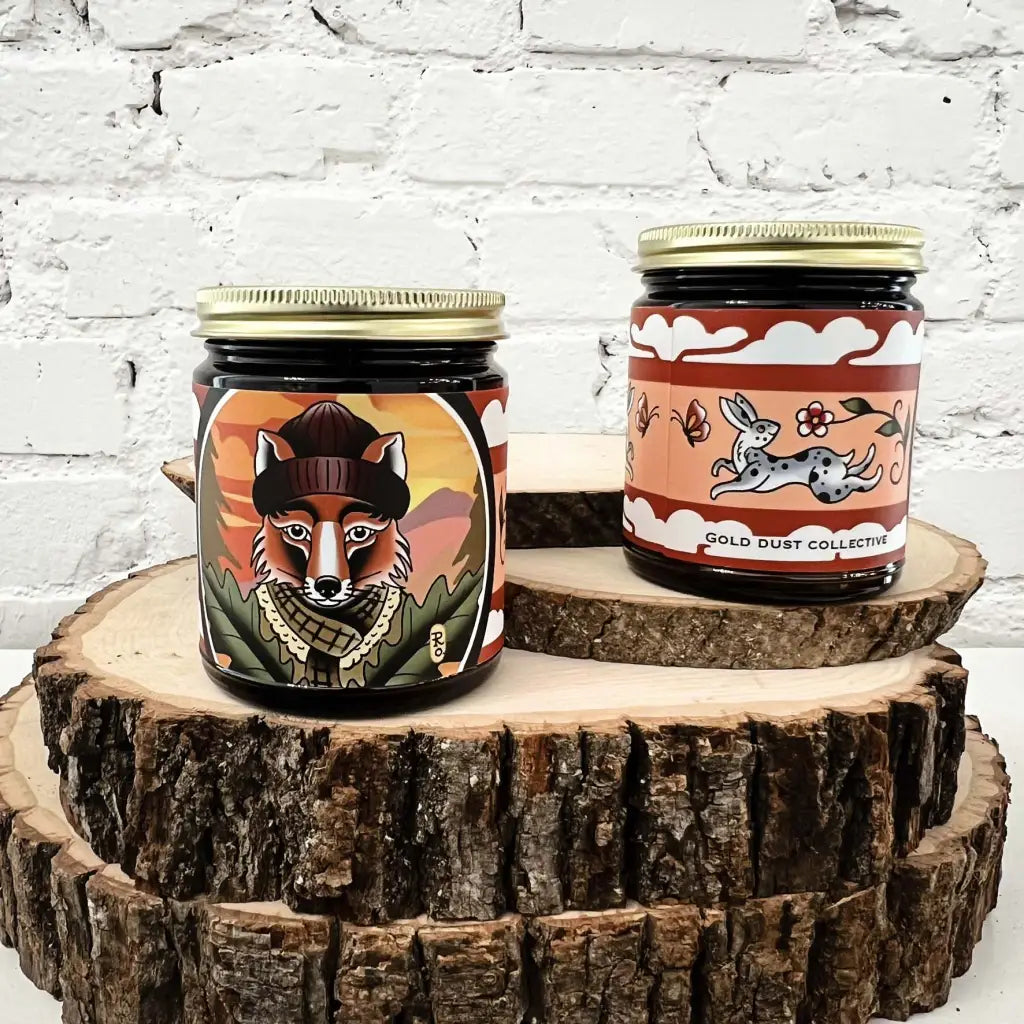 Fall candle with fox illustration label, Golden Hour by Gold Dust Collective, smoky and warm autumn scent.