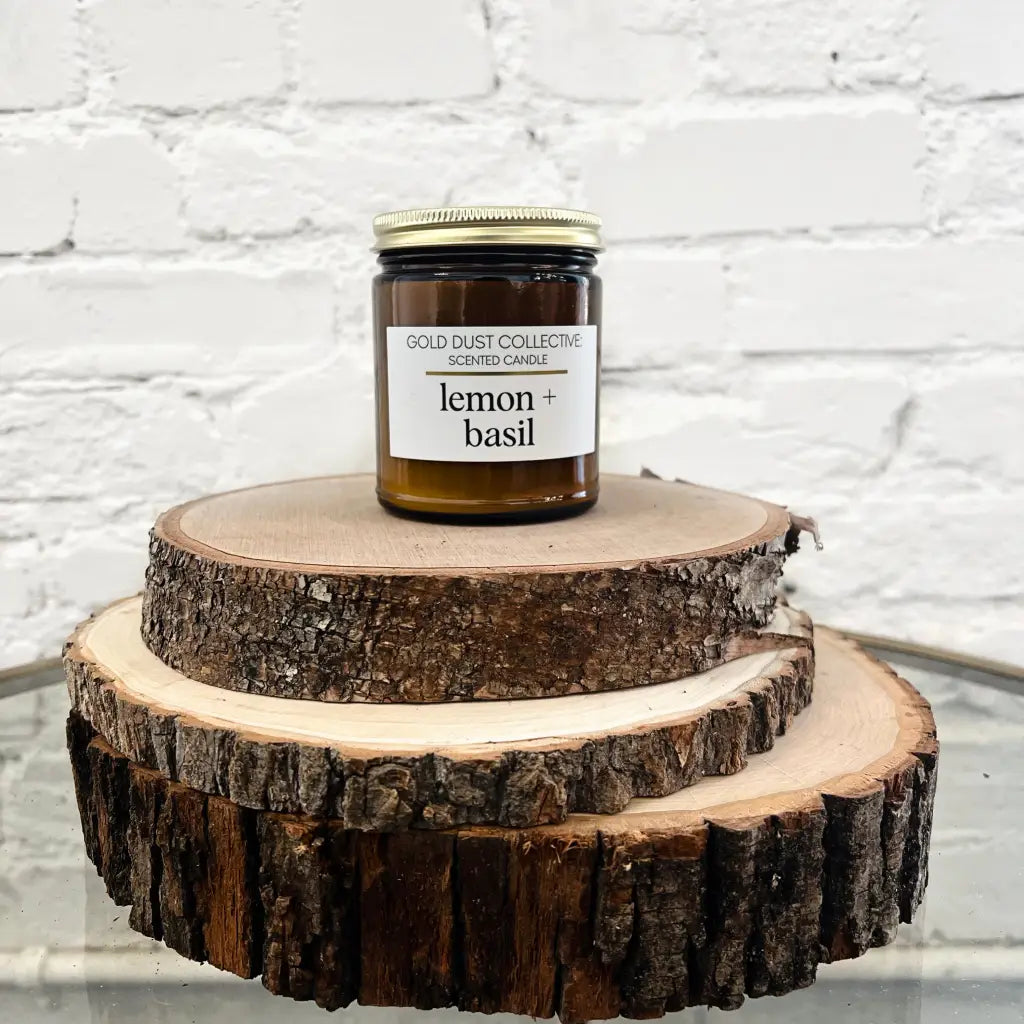 Lemon + Basil Scented Candle - Zesty lemon, enhanced by lively hints of citrus and the invigorating aroma of freshly chopped basil. Note Profile: Aromatic + Citrus Basil, Lemon, Bergamot