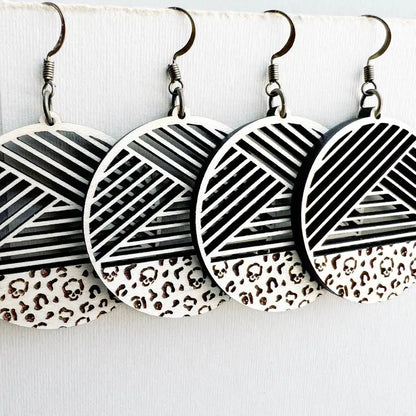 Leopard Skull Print Metric + Maple Wood Drop Earrings - Natural Wood Drop Earrings Shop bold engraved leopard skull wood earrings with geometric designs. Lightweight statement pieces perfect for edgy, modern styles. Made for fashion lovers.