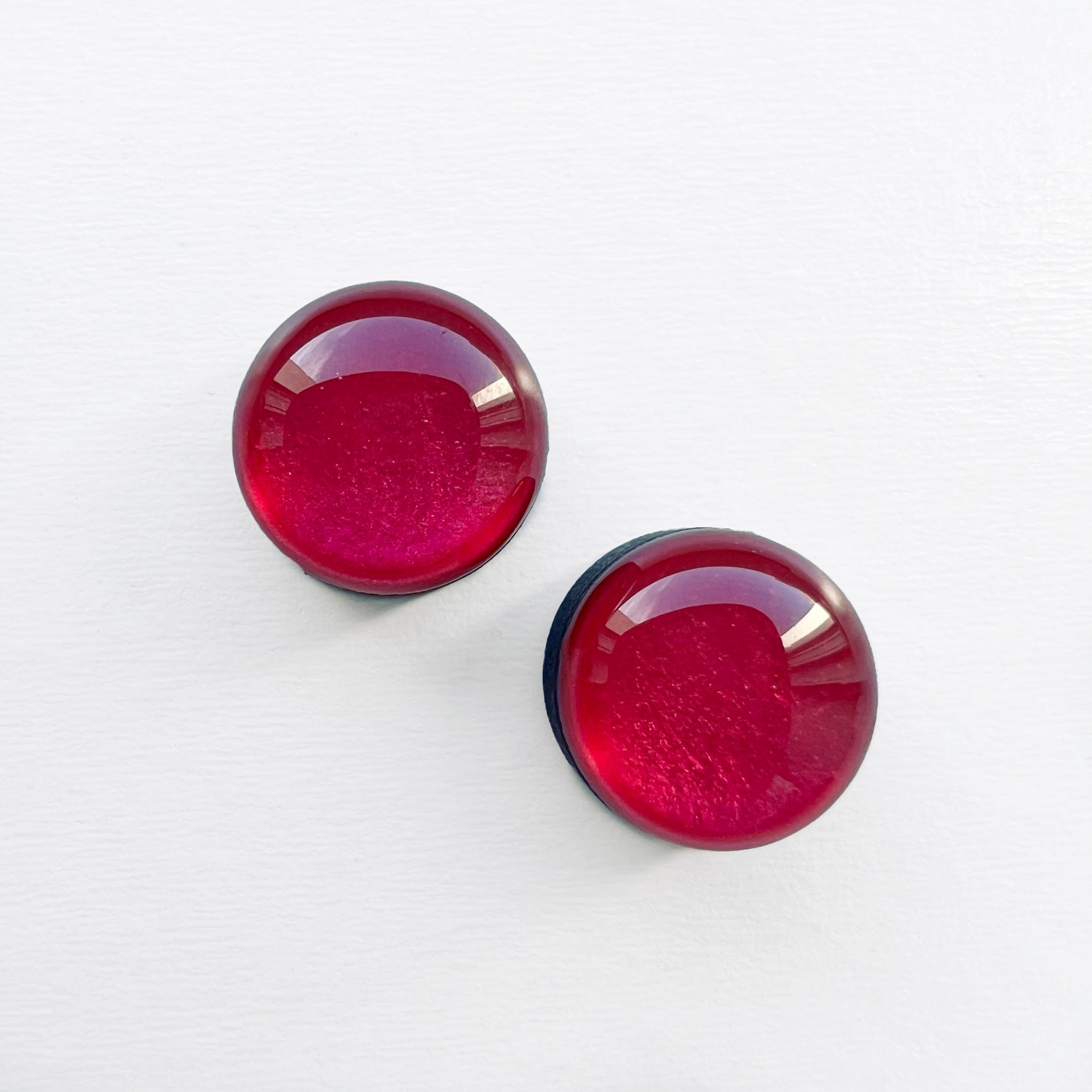 Pearly circle magenta wood earring studs. Hypoallergenic with titanium posts. Resin finish